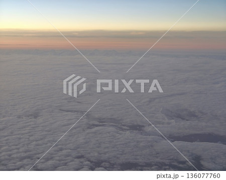 Environmental science exploration of sunrise cloud textures and light interactions in atmosphere 136077760