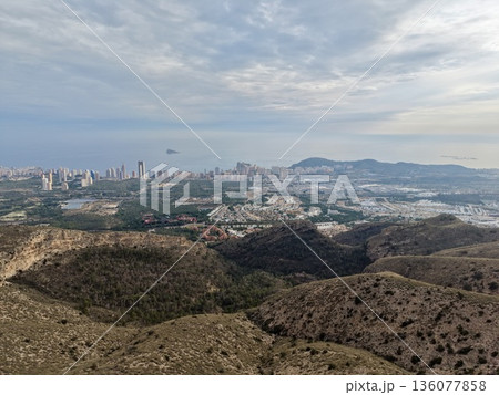 City sprawl view, Scene depicting urban expansion with natural surroundings and infrastructure 136077858