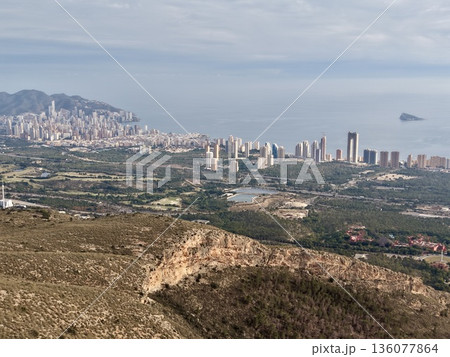 Skyline view with horizon details, Urban outskirts featuring coastal structures and water reflections Skyline view with horizon details, Urban outskirts featuring coastal structures and water reflections 136077864