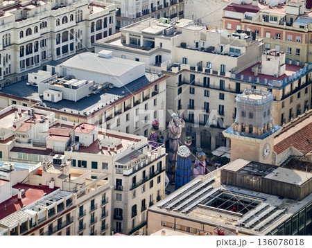 Aerial view reveals detailed terracotta rooftops and sculptural elements reflecting heritage 136078018