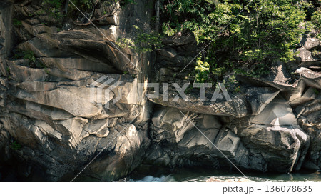 Fast Mountain River Flowing Through Rocky Gorge Fast Mountain River Flowing Through Rocky Gorge 136078635
