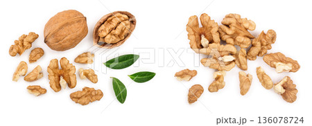 Walnuts with leaf isolated on white background. Top view. Flat lay Walnuts with leaf isolated on white background. Top view. Flat lay 136078724