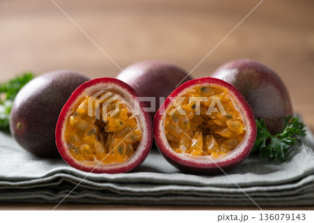 Fresh passion fruit on fabric, Tropical fruit Fresh passion fruit on fabric, Tropical fruit 136079143