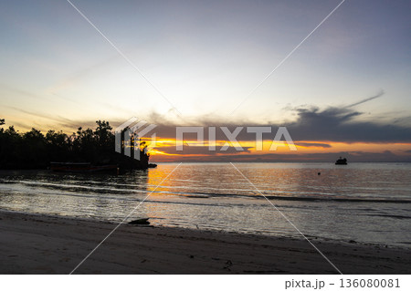 Sunset on Lia beach, Waleakodi Island, Togian archipelago, Sulawesi, Indonesia Sunset on Lia beach, Waleakodi Island, Togian archipelago, Sulawesi, Indonesia 136080081
