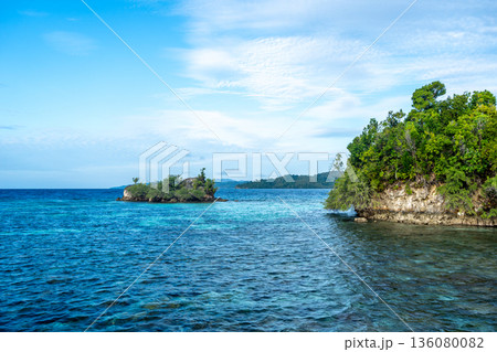 Coastline and turquoise waters of Malenge Island, Sulawesi, Indonesia Coastline and turquoise waters of Malenge Island, Sulawesi, Indonesia 136080082