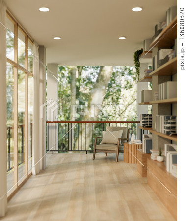 Wooden armchair and side table beside large bookshelf in a parquet floor veranda or porch of a house 136080320