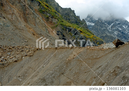 Chalaadi Glacier, ice, moraine and snow in the Caucasus Mountains in autumn, Mestia, Svaneti, Georgia. 136081103