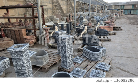 Concrete molds for yard decoration located on the territory of the manufacturer's factory Concrete molds for yard decoration located on the territory of the manufacturer's factory 136082296