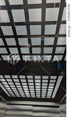 Architecture of elevator interior illuminated by natural light Architecture of elevator interior illuminated by natural light 136082300
