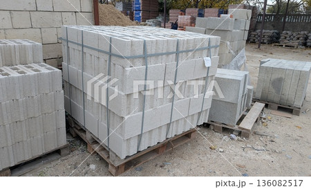 Industrial Yard With Concrete Blocks On Pallets Ready For Shipment Or Storage For Construction 136082517