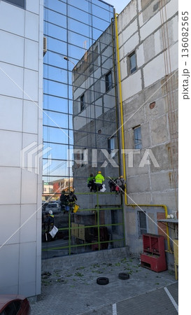 Maintenance Team Conducts Thorough Exterior Inspections Emphasizing Safety Protocols And Teamwork Maintenance Team Conducts Thorough Exterior Inspections Emphasizing Safety Protocols And Teamwork 136082565