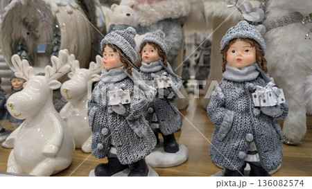Handcrafted Dolls And Reindeer Display, Artisancrafted Soft Toys Accented By Seasonal Holiday Decorations Handcrafted Dolls And Reindeer Display, Artisancrafted Soft Toys Accented By Seasonal Holiday Decorations 136082574