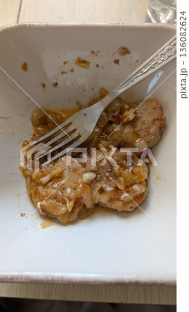 A Savory Shrimp Dish that is Served with a Delicious Sauce and a Fancy Fork for Eating A Savory Shrimp Dish that is Served with a Delicious Sauce and a Fancy Fork for Eating 136082624