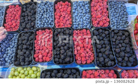 A Colorful and Diverse Assortment of Fresh Berries at a Local Farmers Market Event A Colorful and Diverse Assortment of Fresh Berries at a Local Farmers Market Event 136082628