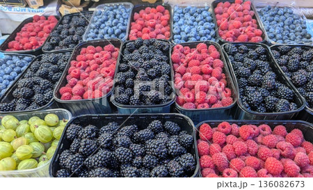 A Stunning Display of Fresh Berries at the Local Market, Bursting with Color and Flavor A Stunning Display of Fresh Berries at the Local Market, Bursting with Color and Flavor 136082673