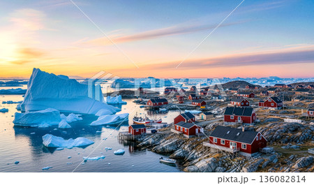 Traditional colorful wooden houses in greenland village on rocky coast with icebergs in ocean bay at sunset arctic travel destination Traditional colorful wooden houses in greenland village on rocky coast with icebergs in ocean bay at sunset arctic travel destination 136082814