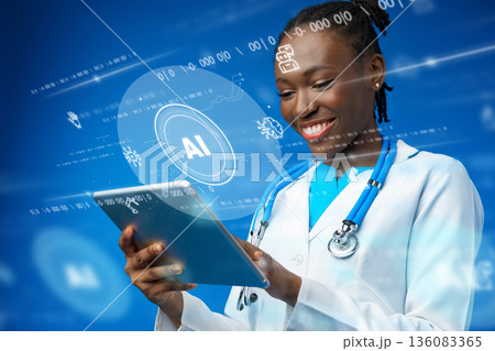 Healthcare professional uses technology to engage with patient data on a tablet Healthcare professional uses technology to engage with patient data on a tablet 136083365