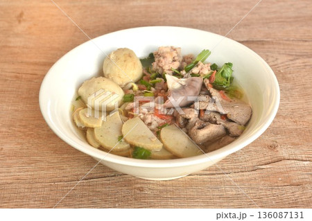 slice Vietnamese sausage and chop pork couple liver with meatball in clear soup on bowl slice Vietnamese sausage and chop pork couple liver with meatball in clear soup on bowl 136087131