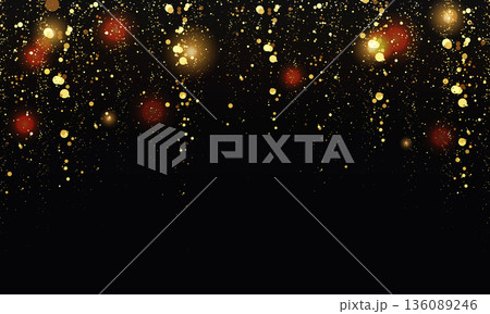 Golden glowing particles on dark background 136089246