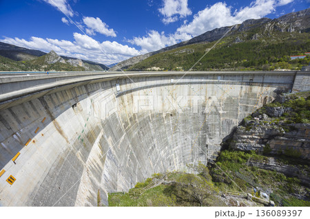 Verdon dam wall with engineering structure and mountains Verdon dam wall with engineering structure and mountains 136089397