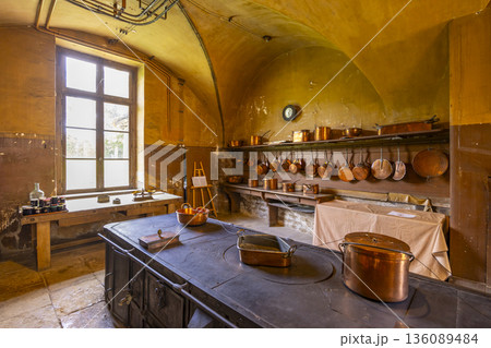 Historic kitchen interior with copper cookware in Commarin, France Historic kitchen interior with copper cookware in Commarin, France 136089484