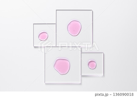 A skin serum or a moisturizing gel or a face wash gel. Cosmetic product. White background. A skin serum or a moisturizing gel or a face wash gel. Cosmetic product. White background. 136090018