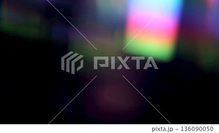 colorful rainbow crystal light leaks on black background 136090050