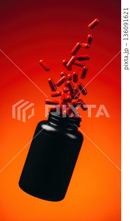 Explosion of Red Capsules Flying Out of Black Supplement Bottle 136091621