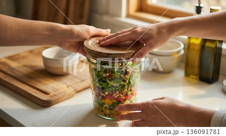 Modern Healthy Meal Prep with Glass Containers on Kitchen Table 136091781