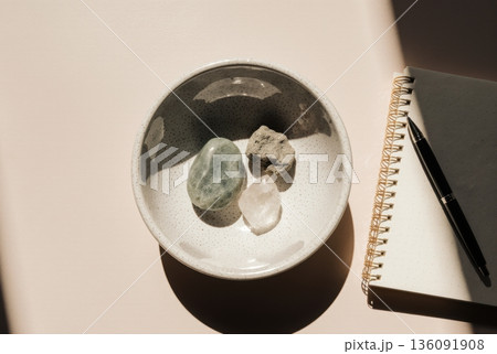 Crypto Storage Types as Natural Stones in Ceramic Bowl 136091908