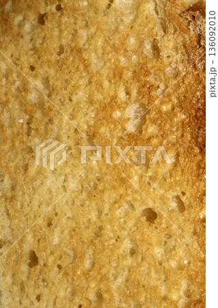Close up of toast bread food texture golden toasted Close up of toast bread food texture golden toasted 136092010