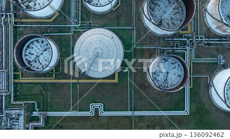 Aerial view oil and gas refinery petrochemical storage tank and pipeline steel, Oil and gas transportation system pipeline steel at oil and gas refinery industry chemical plant, Pipeline oil and gas. 136092462