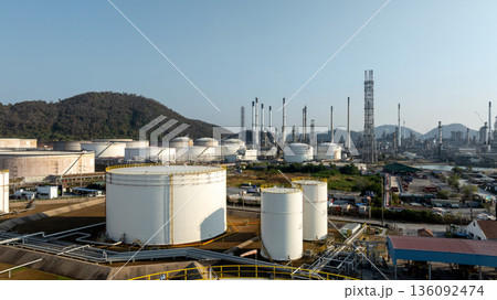 Aerial view of oil and gas petrochemical storage tank and pipeline steel, Oil and gas transportation system pipeline steel at oil and gas refinery industry petrochemical plant, Pipeline oil and gas. 136092474