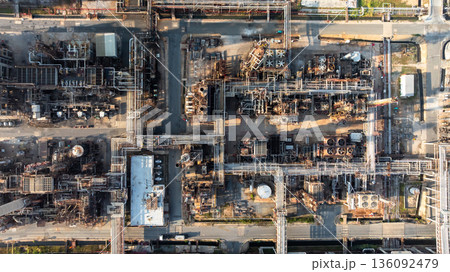 Aerial view of oil and gas petrochemical storage tank and pipeline steel, Oil and gas transportation system pipeline steel at oil and gas refinery industry petrochemical plant, Pipeline oil and gas. Aerial view of oil and gas petrochemical storage tank and pipeline steel, Oil and gas transportation system pipeline steel at oil and gas refinery industry petrochemical plant, Pipeline oil and gas. 136092479