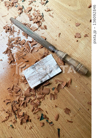 Woodworking tools and shavings on a wooden surface Woodworking tools and shavings on a wooden surface 136092846