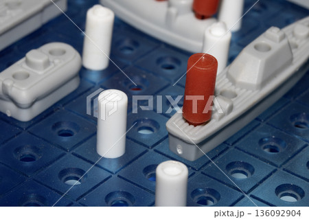 Close up of strategic battleships board game with ships and pegs 136092904
