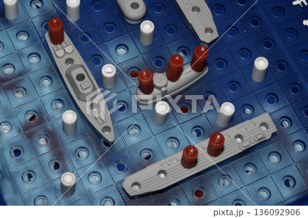 Close up of strategic battleships board game with ships and pegs 136092906