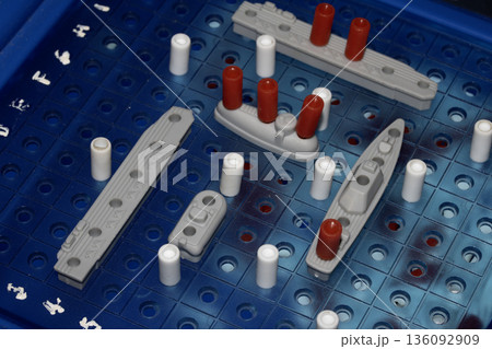 Close up of strategic battleships board game with ships and pegs 136092909
