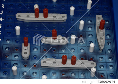 Close up of strategic battleships board game with ships and pegs 136092914