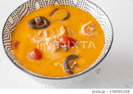 Creamy tom yum soup with shrimp coconut milk and herbs Creamy tom yum soup with shrimp coconut milk and herbs 136095288