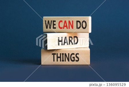 Support, help we can do hard things symbol. Concept words We can do hard things on beautiful wooden blocks. Beautiful grey background. Business we can do hard things concept. Copy space. 136095529