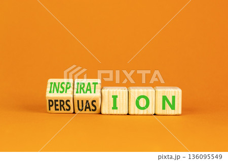 Persuasion or inspiration symbol. Concept words Persuasion and Inspiration on wooden cubes. Beautiful orange background. Psychology persuasion inspiration concept. Copy space. 136095549