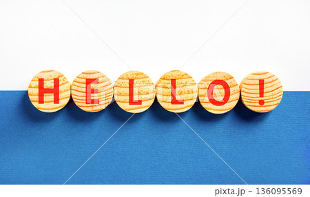 Hello welcome support and help symbol. Concept word Hello on beautiful wooden circles. Beautiful blue and white background. Business psychological hello support and help concept. Copy space. 136095569