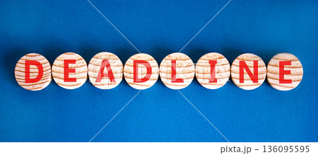 Deadline word symbol. Concept word Deadline on beautiful wooden circles. Beautiful blue background. Business support help deadline word concept. Copy space. Deadline word symbol. Concept word Deadline on beautiful wooden circles. Beautiful blue background. Business support help deadline word concept. Copy space. 136095595