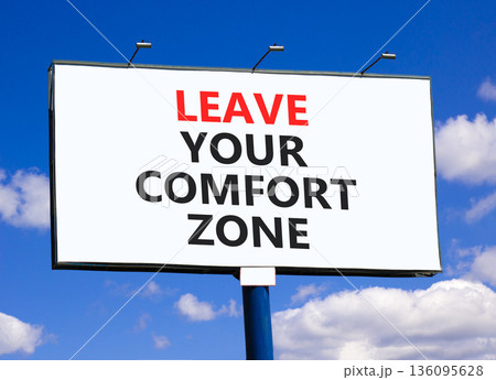 Leave your comfort zone symbol. Concept words Leave your comfort zone on beautiful big billboard. Beautiful blue sky background. Business psychological Leave your comfort zone concept. Copy space. 136095628
