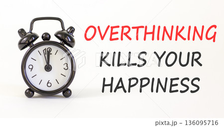 Overthinking kills your happiness symbol. Concept words Overthinking kills your happiness on white paper. Beautiful white paper background. Business overthinking kills happiness concept. Copy space. 136095716