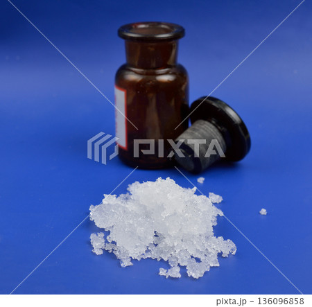 Zinc nitrate on the beige background 136096858