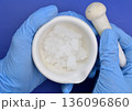 Zinc nitrate on the beige background 136096860