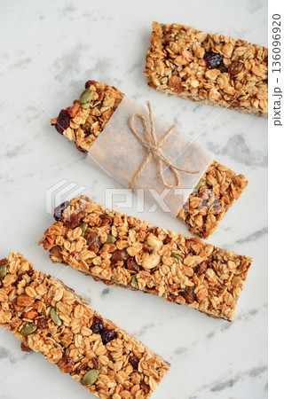 Gluten-free oat granola bars with nuts and berries. Gluten-free oat granola bars with nuts and berries. 136096920
