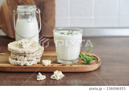 Homemade natural kefir or ayran with rice cakes 136096955